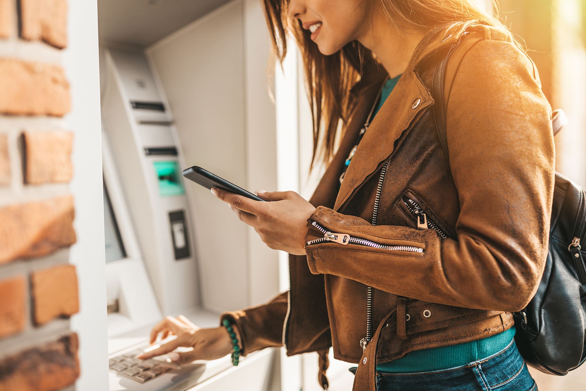 woman using ATM